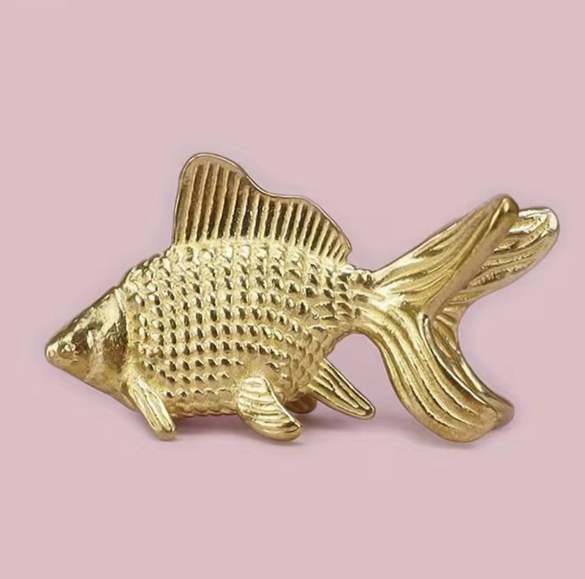 dettaglio in ottone pesce